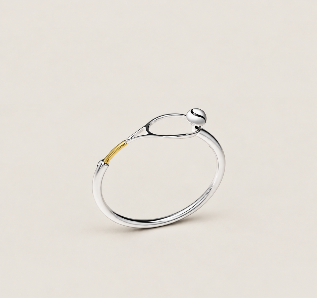 SOVA tennis-racket bracelet with silver-coloured band and gold-coloured detail